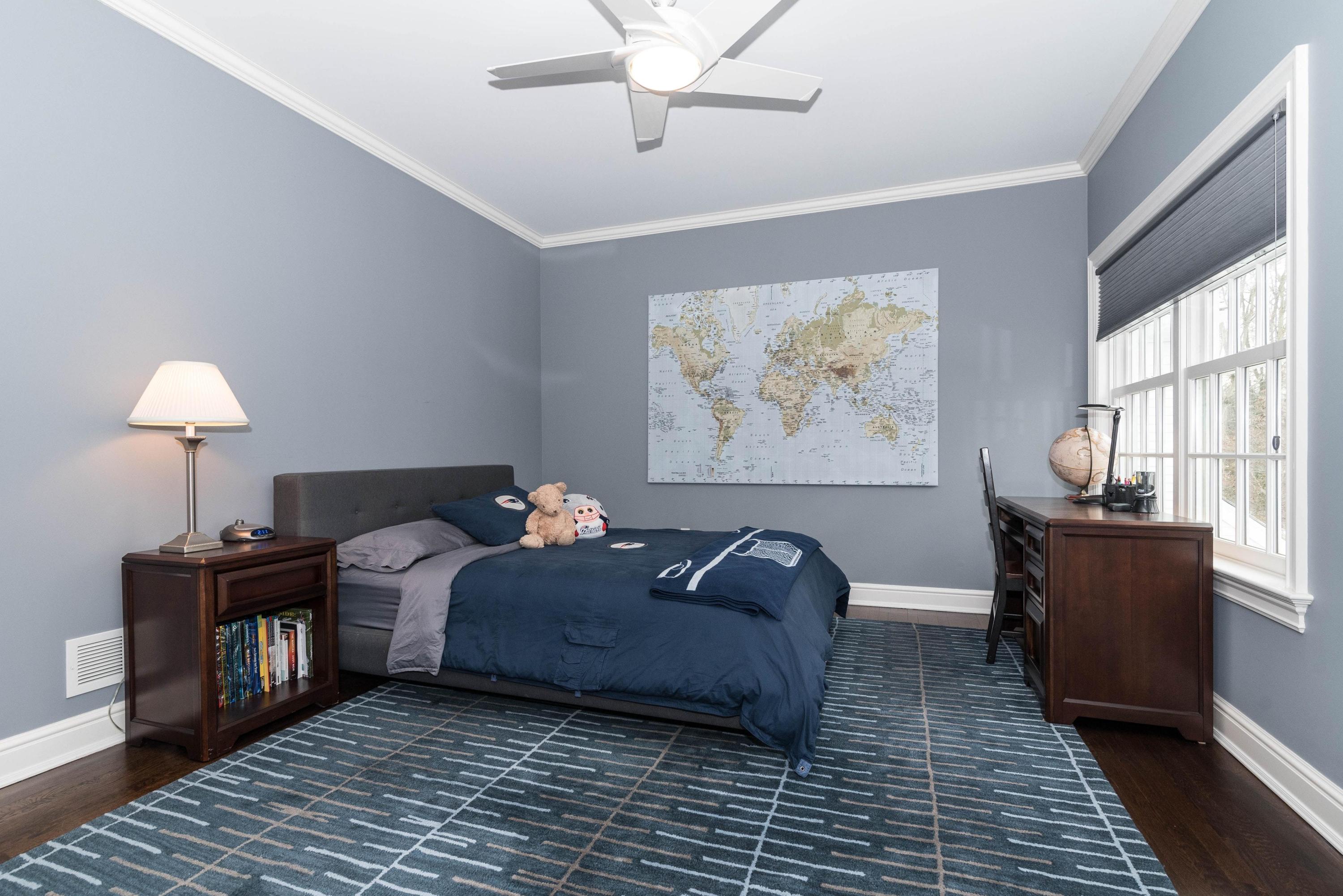 48 Leeuwarden Road Darien, CT 06820 - Photo 20 of 35 a living room with a bed furniture and next to a window