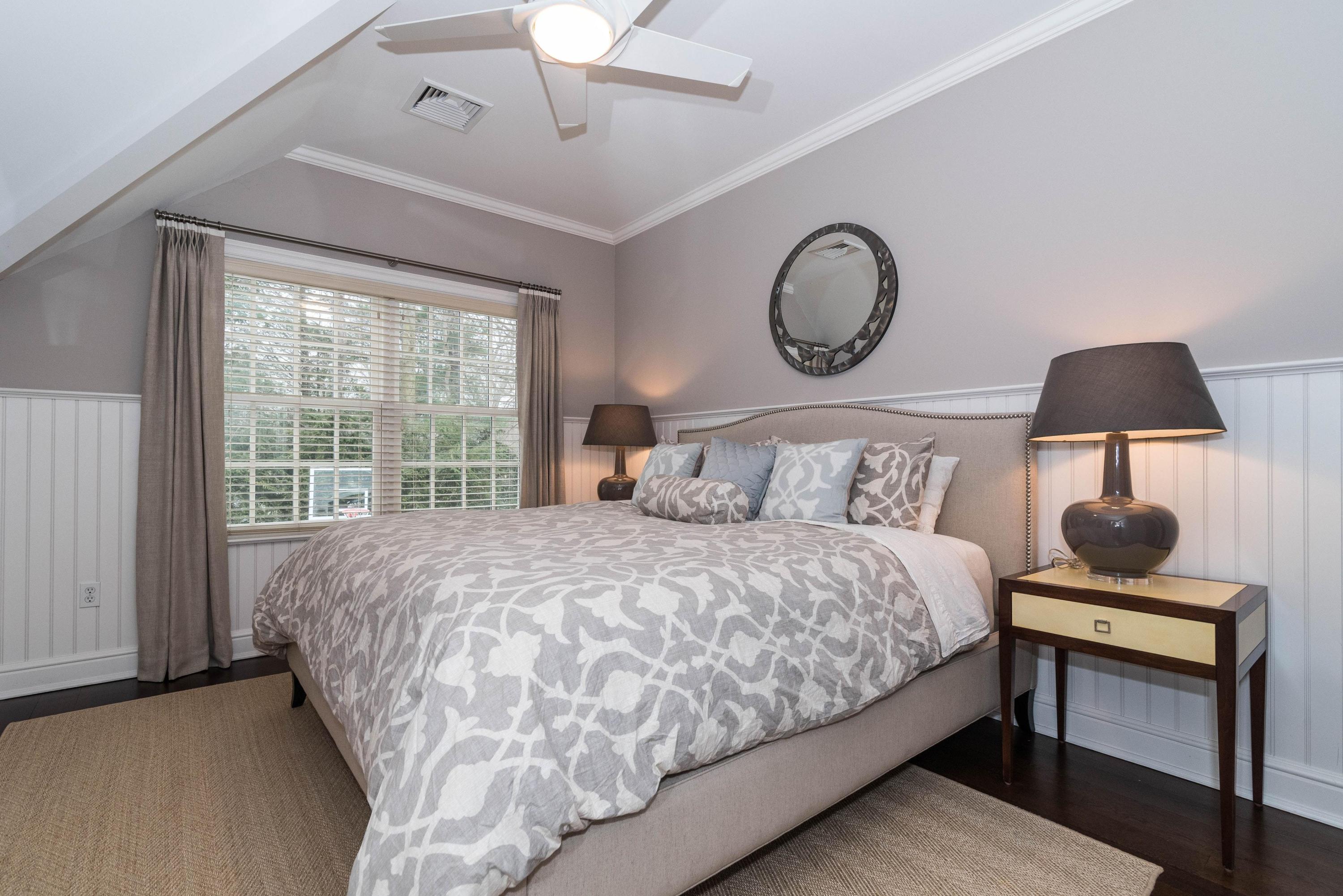 48 Leeuwarden Road Darien, CT 06820 - Photo 23 of 35 a bedroom with bed and a window