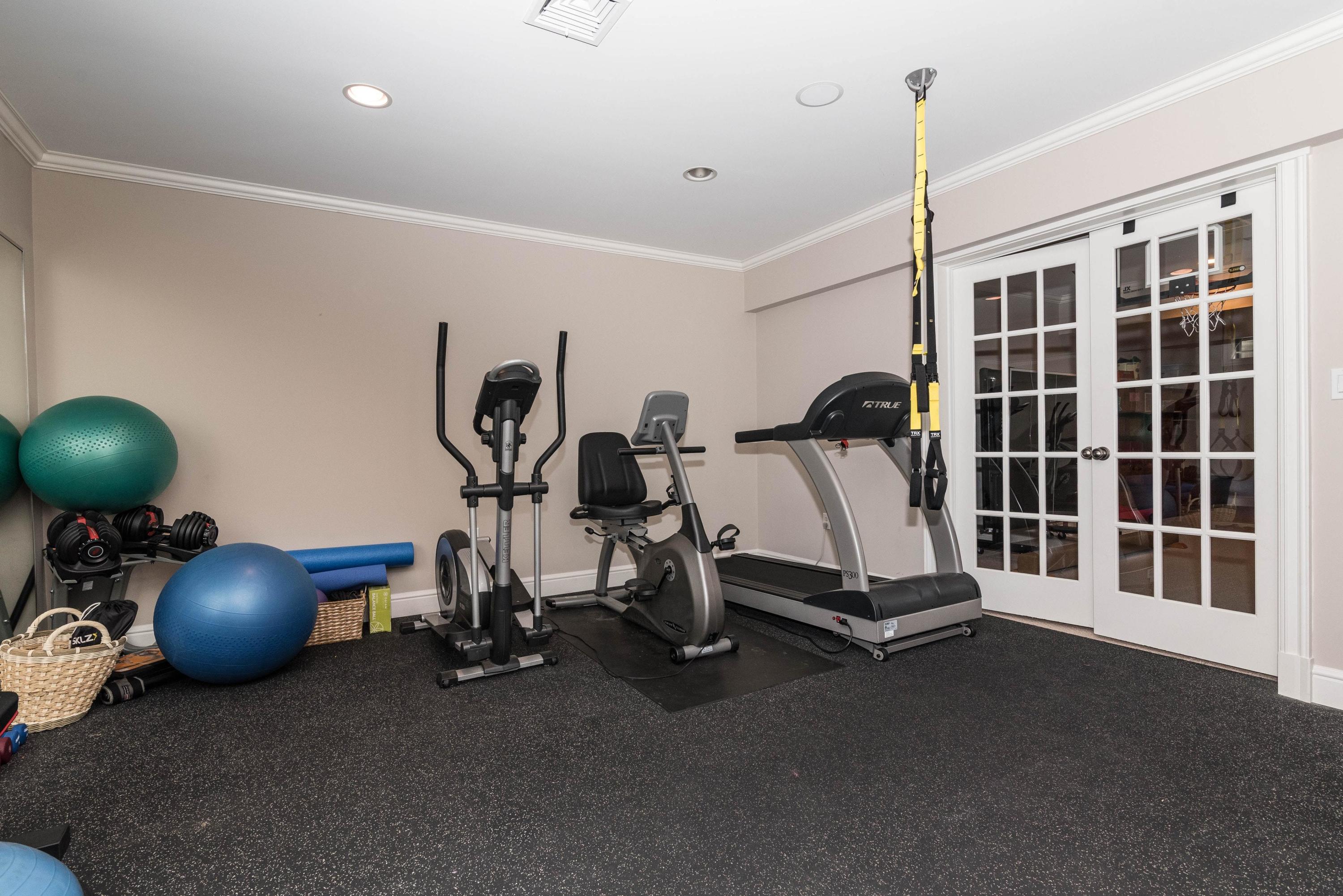 48 Leeuwarden Road Darien, CT 06820 - Photo 26 of 35 a view of a room with gym equipment