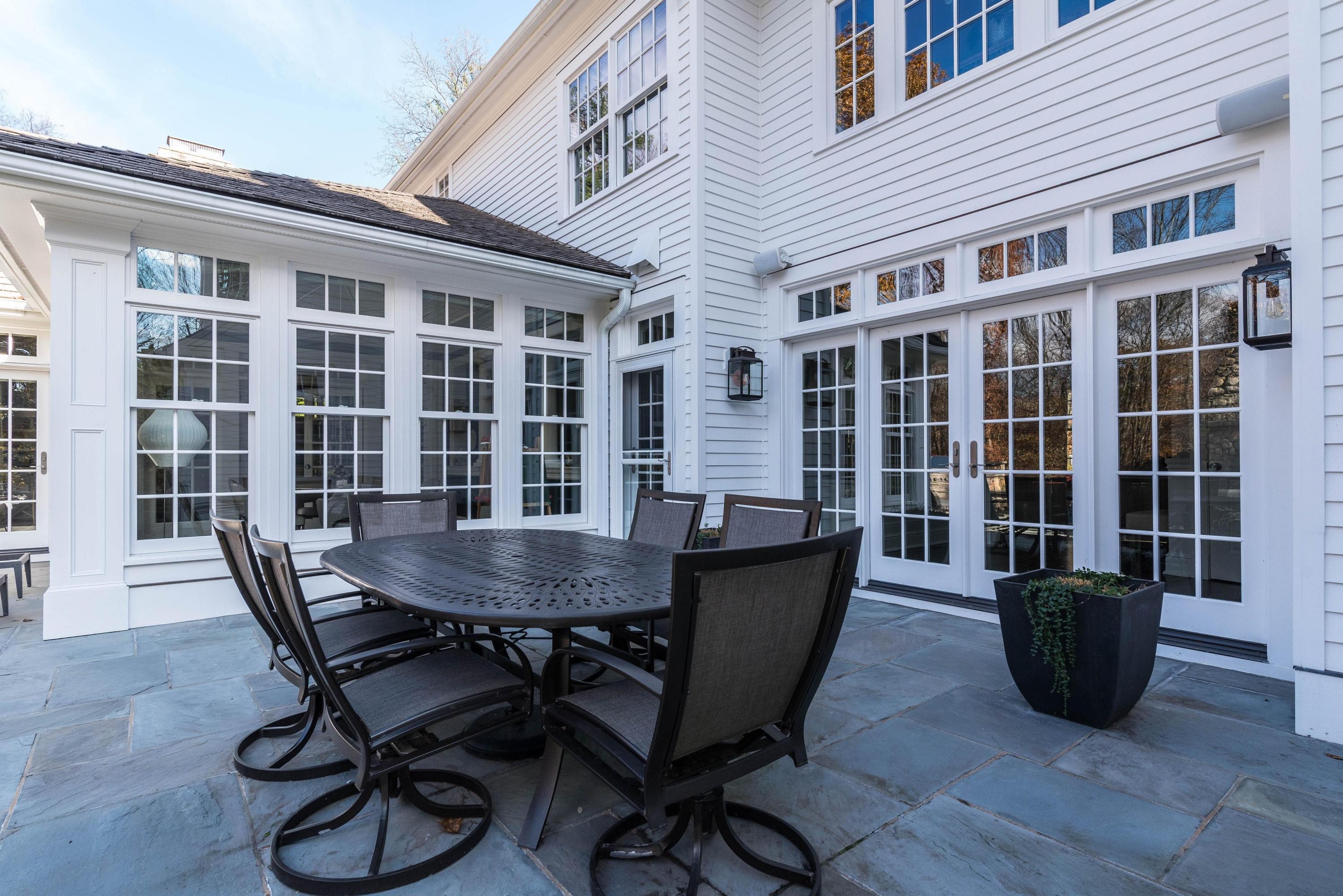 48 Leeuwarden Road Darien, CT 06820 - Photo 29 of 35 a view of a dining room with furniture and wooden floor