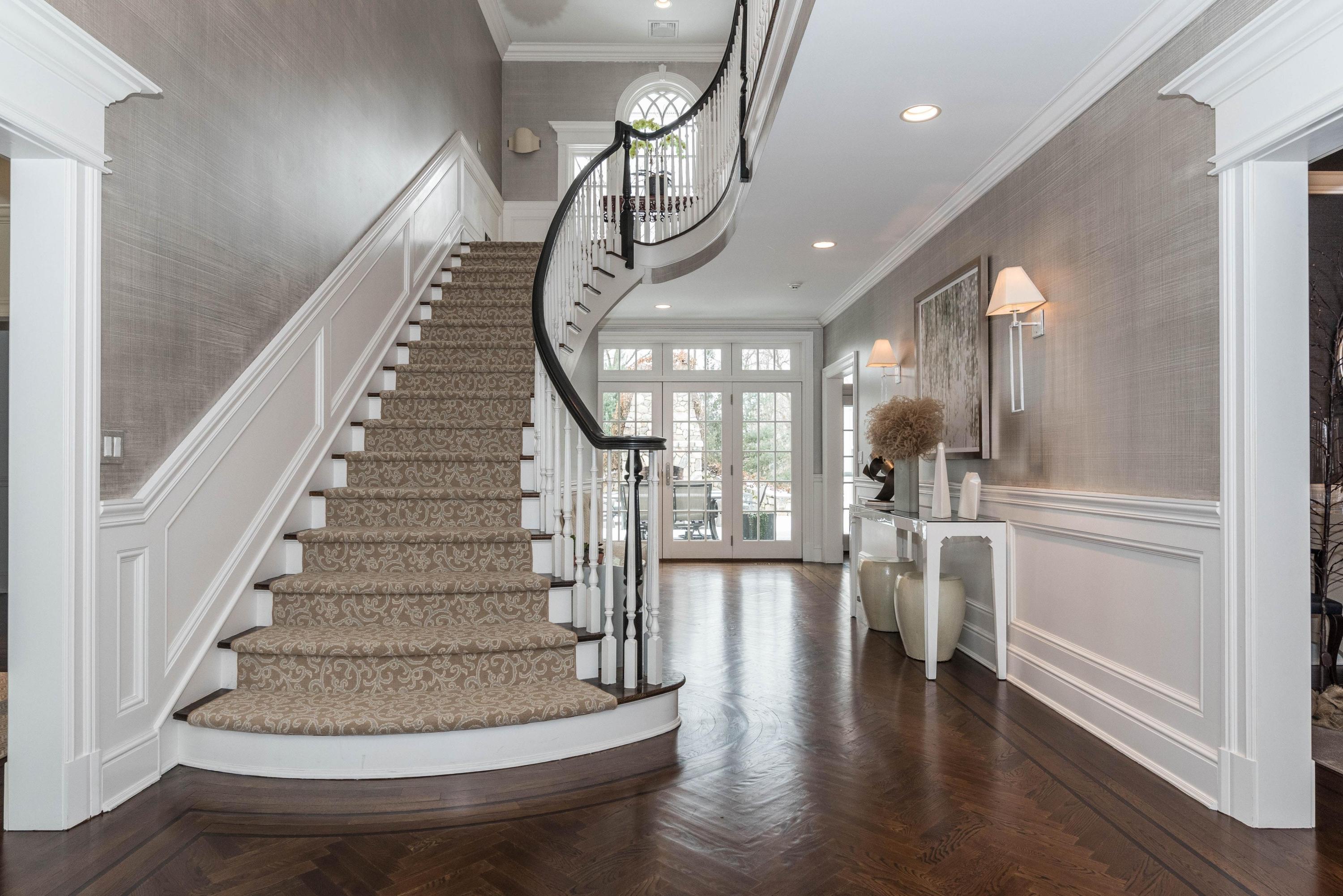 48 Leeuwarden Road Darien, CT 06820 - Photo 4 of 35 a view of entryway and hall with wooden floor