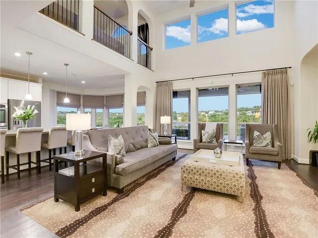 a living room with furniture and a table