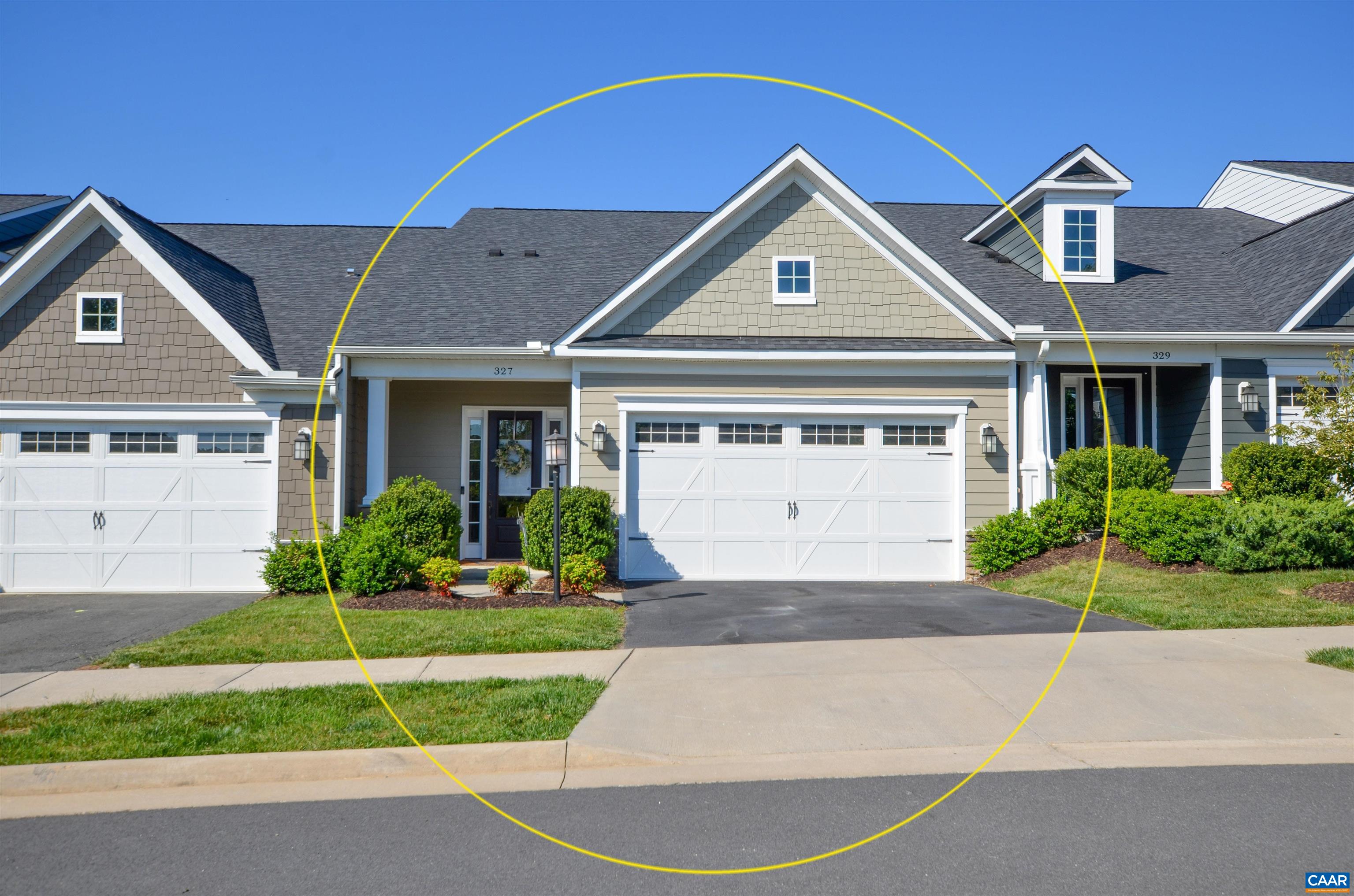 327 Claibourne Road Crozet, VA 22932 - Photo 36 of 36 a front view of a house with a yard and garage