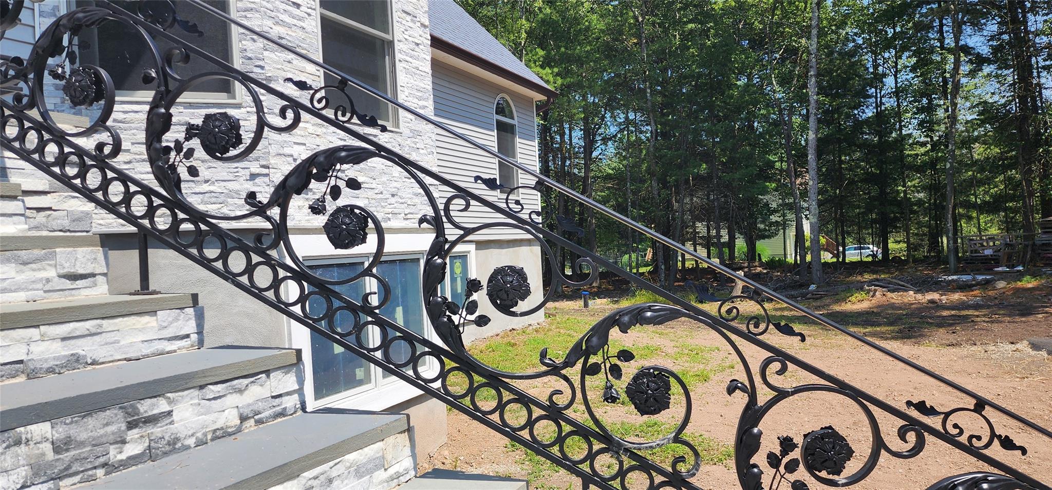 57 Haddock Road Monticello, NY 12701 - Photo 19 of 46 a building with trees in front of it