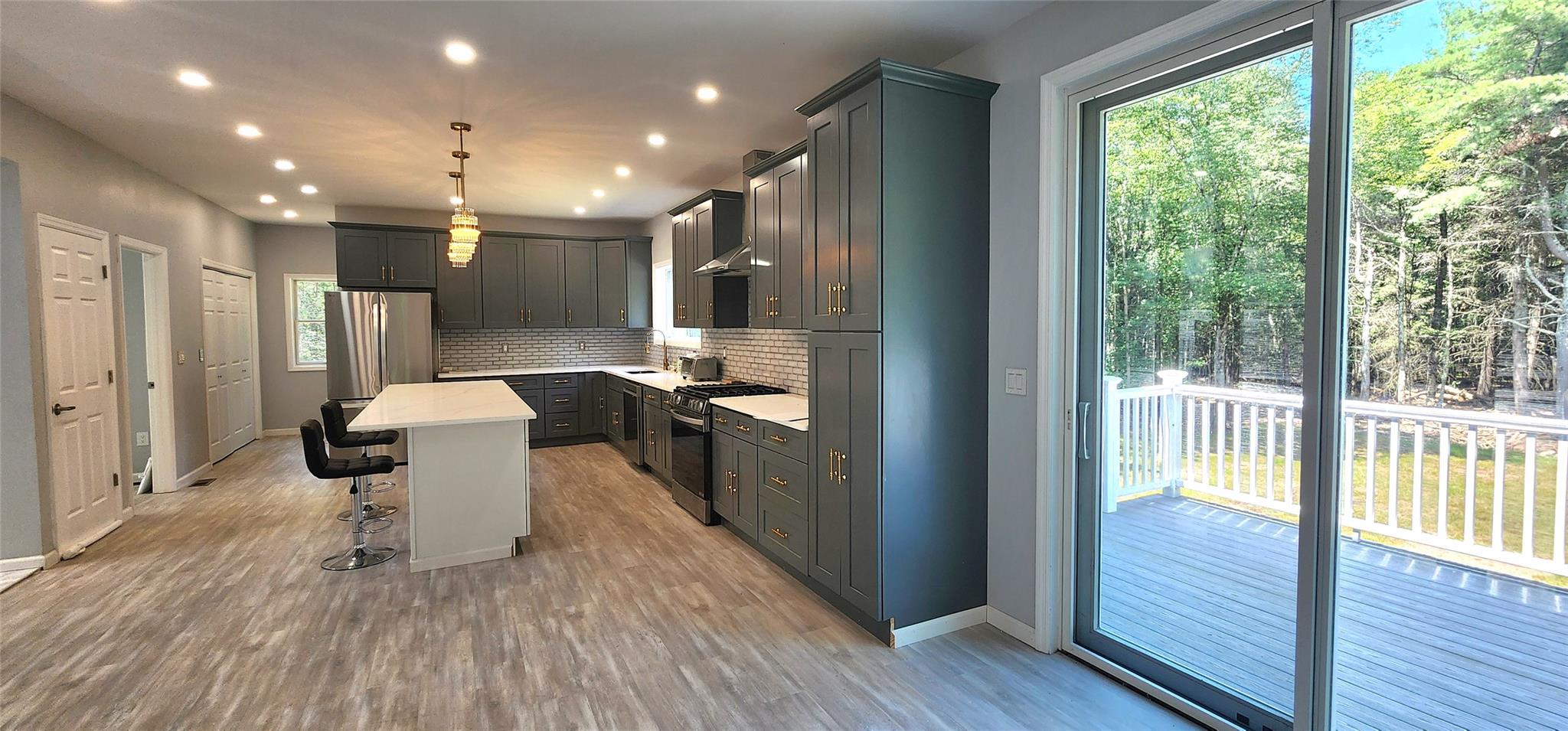 57 Haddock Road Monticello, NY 12701 - Photo 21 of 46 a living room with furniture and a wooden floor