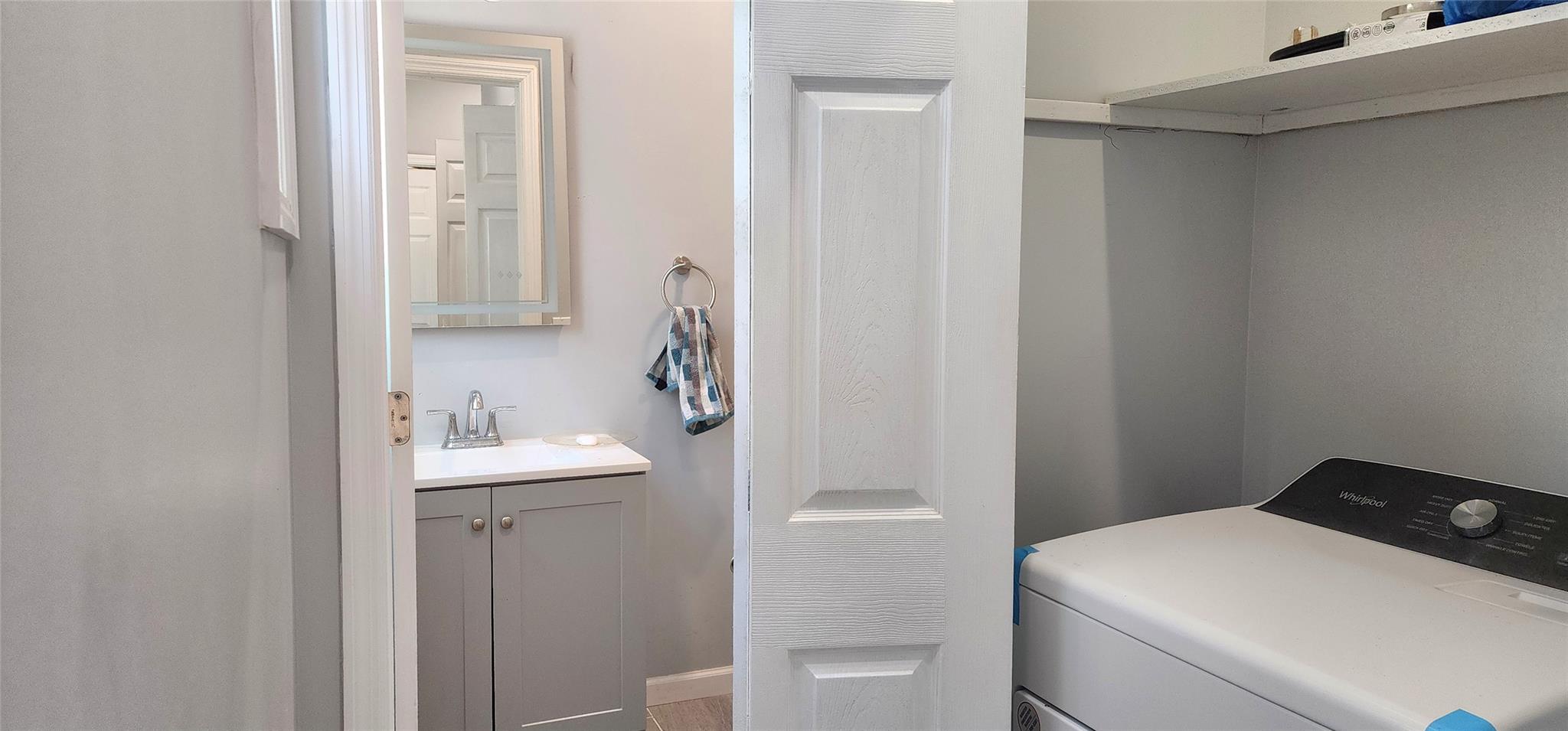 57 Haddock Road Monticello, NY 12701 - Photo 44 of 46 a bathroom with a sink toilet and vanity