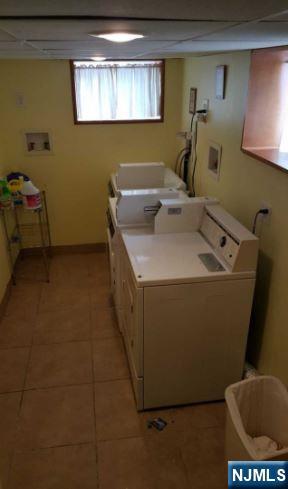 50 Columbia Avenue, Unit 2 Kearny, NJ 07032 - Photo 11 of 11 a bathroom with a sink toilet and mirror