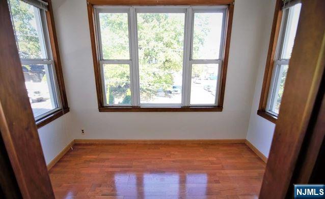 50 Columbia Avenue, Unit 2 Kearny, NJ 07032 - Photo 5 of 11 a view of an empty room with a window