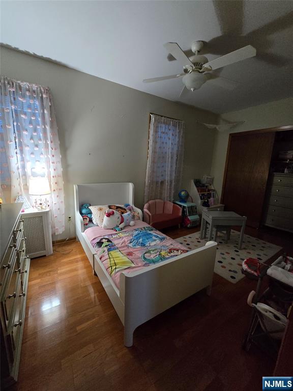 50 Columbia Avenue, Unit 2 Kearny, NJ 07032 - Photo 7 of 11 a living room with furniture and a window