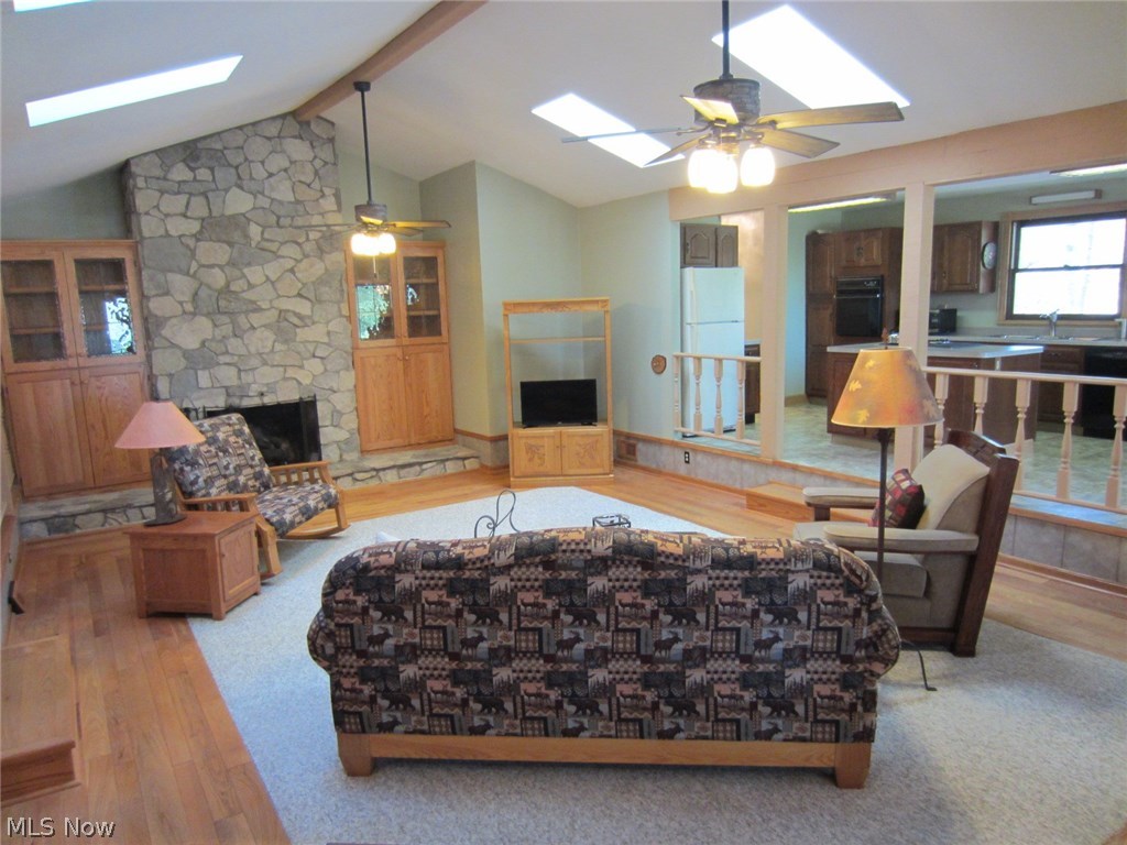 1075 North Quarry Road Amherst, OH 44001 - Photo 2 of 31 Great room w/natural oak hardwood flooring.