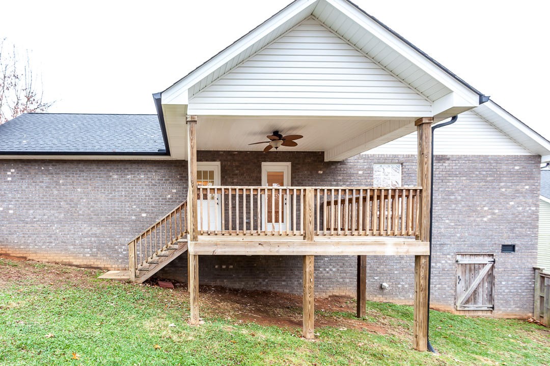 6067 Whisper Ridge Lane Corryton, TN 37721 - Photo 33 of 35 a balcony view with a sink and a yard