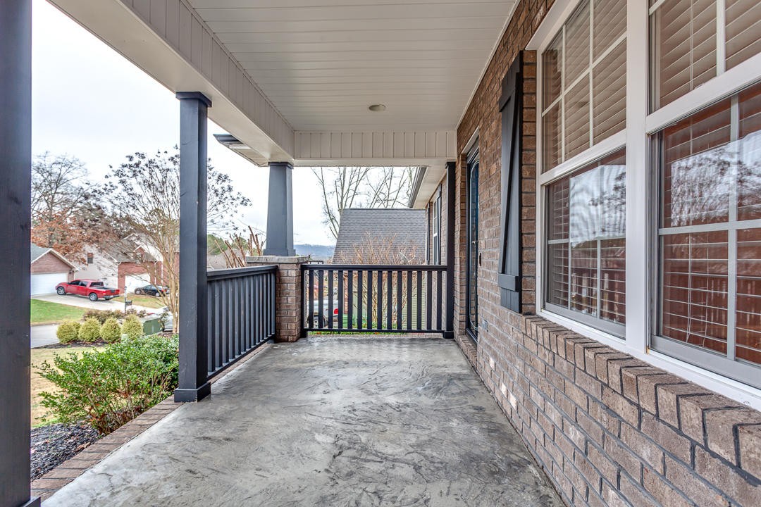 6067 Whisper Ridge Lane Corryton, TN 37721 - Photo 6 of 35 a view of a porch