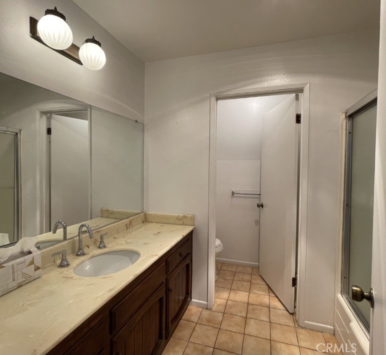 1637 North Verdugo Road, Unit A Glendale, CA 91208 - Photo 16 of 23 a bathroom with a sink and a mirror
