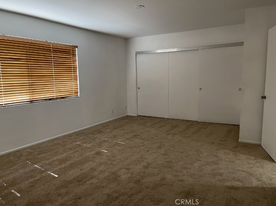 1637 North Verdugo Road, Unit A Glendale, CA 91208 - Photo 20 of 23 a view of an empty room with a window