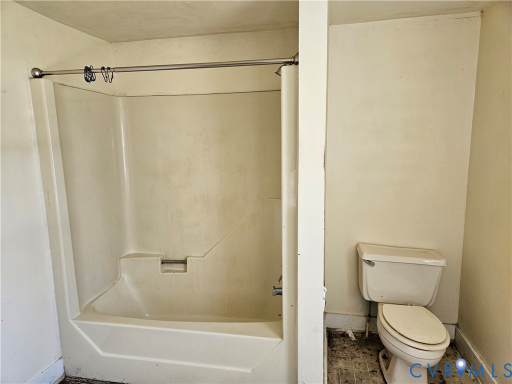 10030 Cheathams Road Amelia Court House, VA 23002 - Photo 13 of 23 a white toilet sitting next to a bath tub