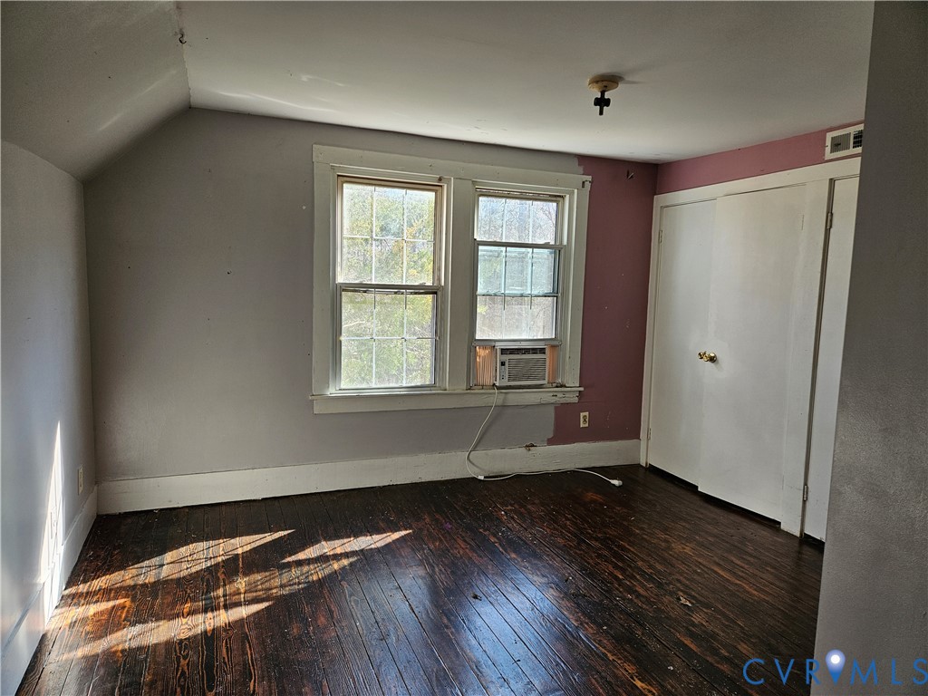 10030 Cheathams Road Amelia Court House, VA 23002 - Photo 19 of 23 a view of wooden floor and windows in a room