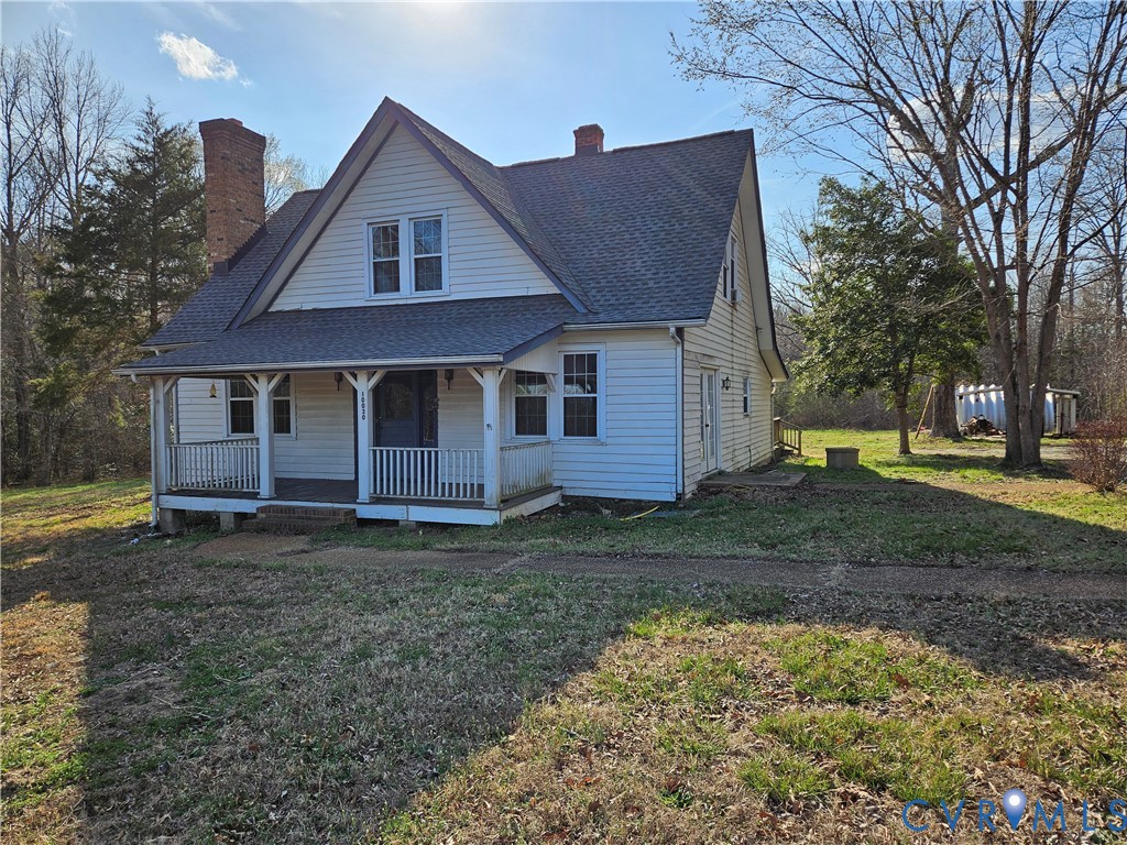 10030 Cheathams Road Amelia Court House, VA 23002 - Photo 23 of 23 a view of a house with a yard