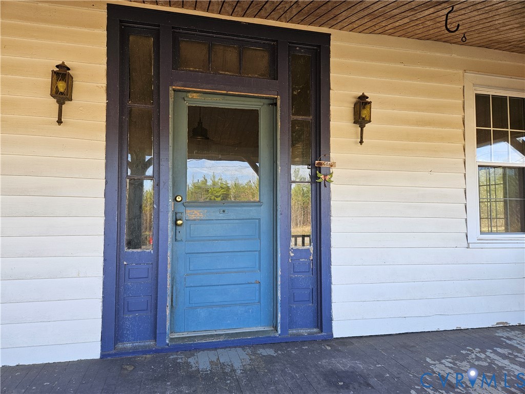10030 Cheathams Road Amelia Court House, VA 23002 - Photo 3 of 23 a view of front door of house