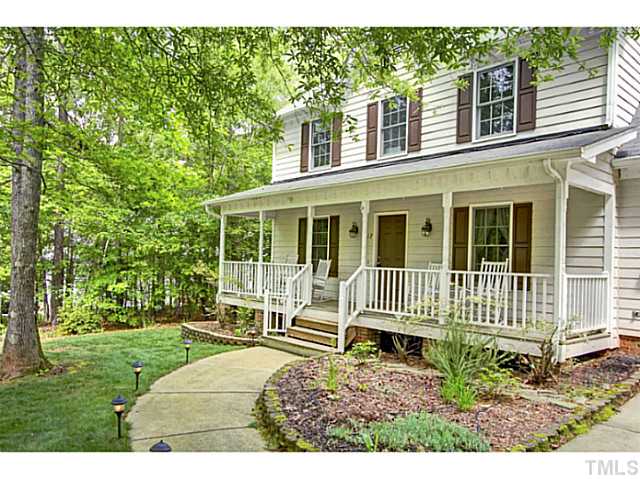 1117 Urania Drive Raleigh, NC 27603 - Photo 25 of 25 a house view with a garden space