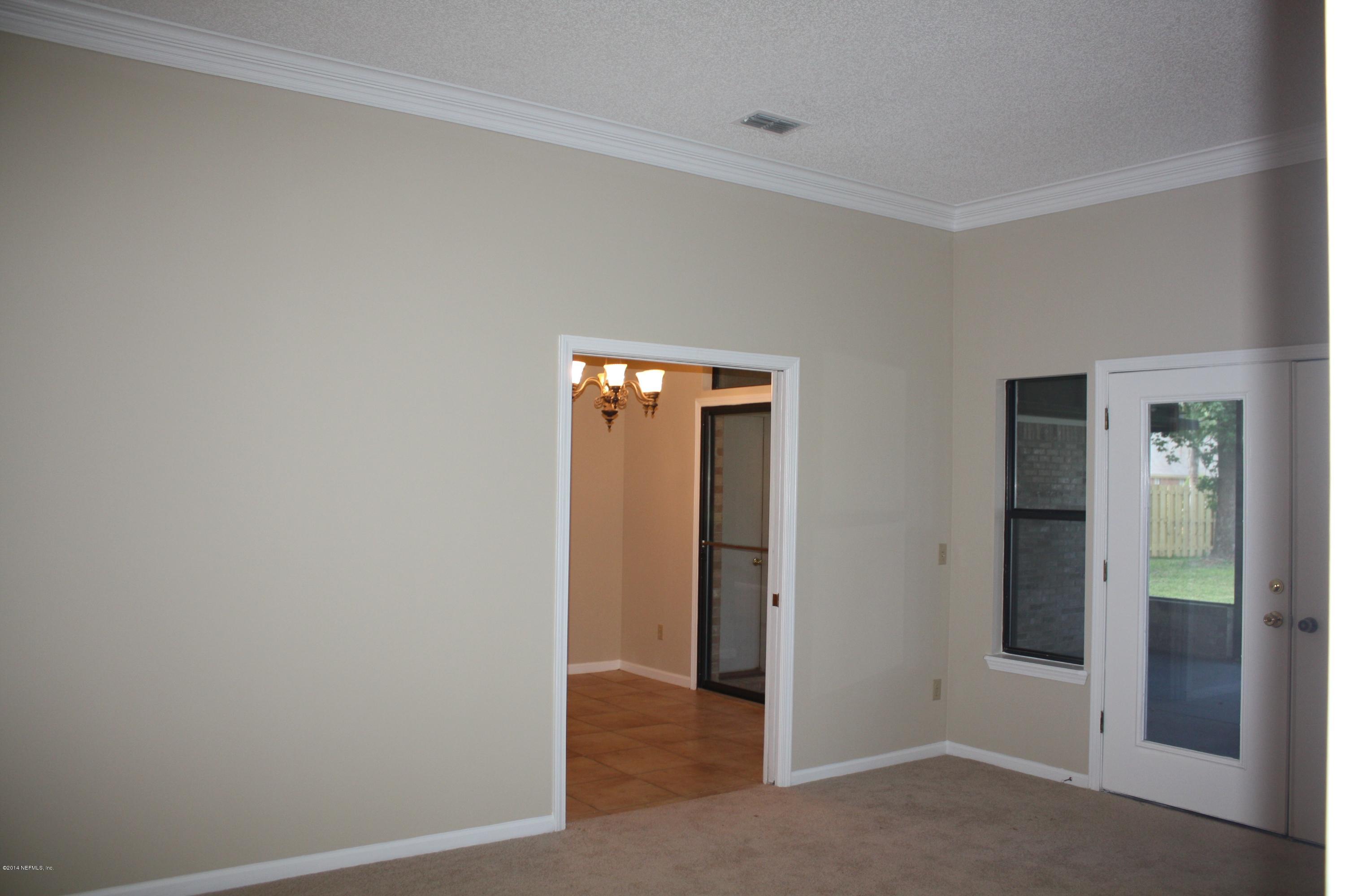 3060 Nautilus Road Middleburg, FL 32068 - Photo 5 of 40 an empty room with closet