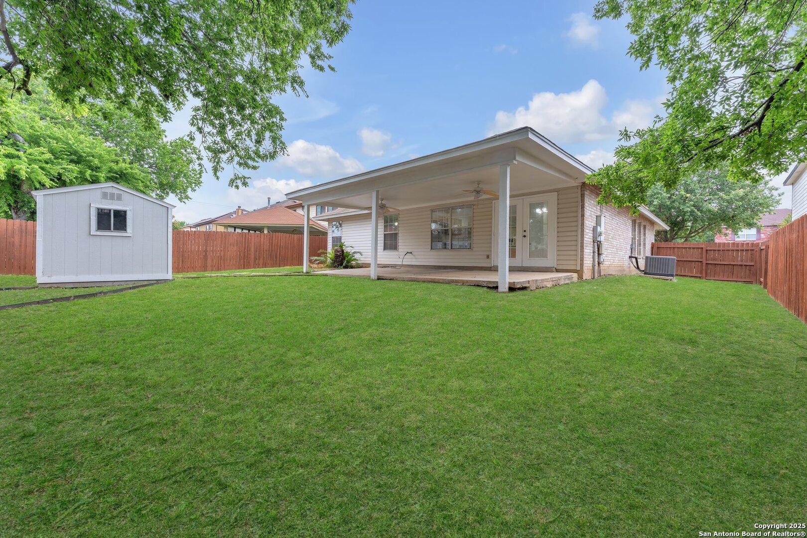 15515 Spring Summit San Antonio, TX 78247 - Photo 35 of 36 front view of a house with a yard