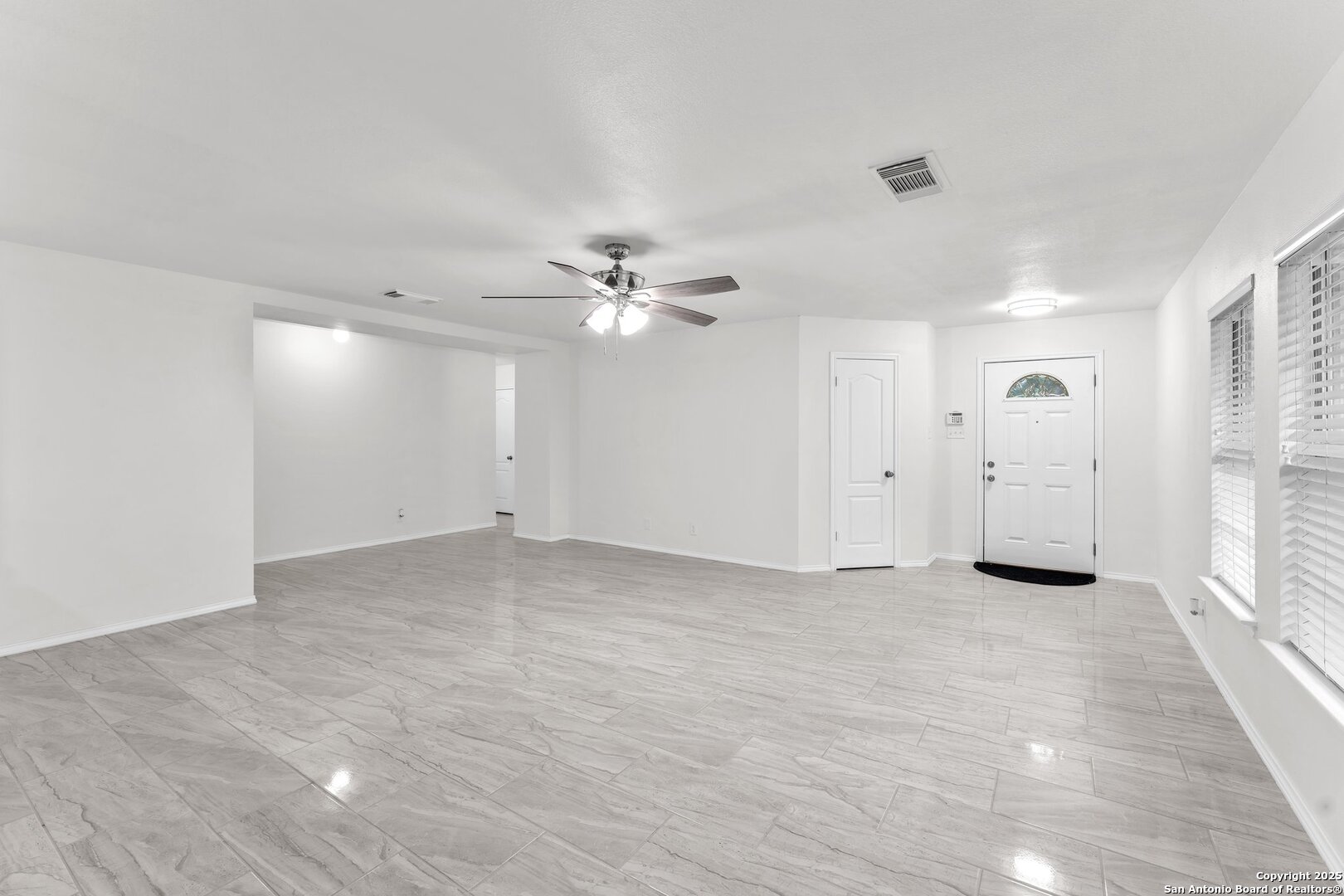 15515 Spring Summit San Antonio, TX 78247 - Photo 6 of 36 a view of an empty room with a window