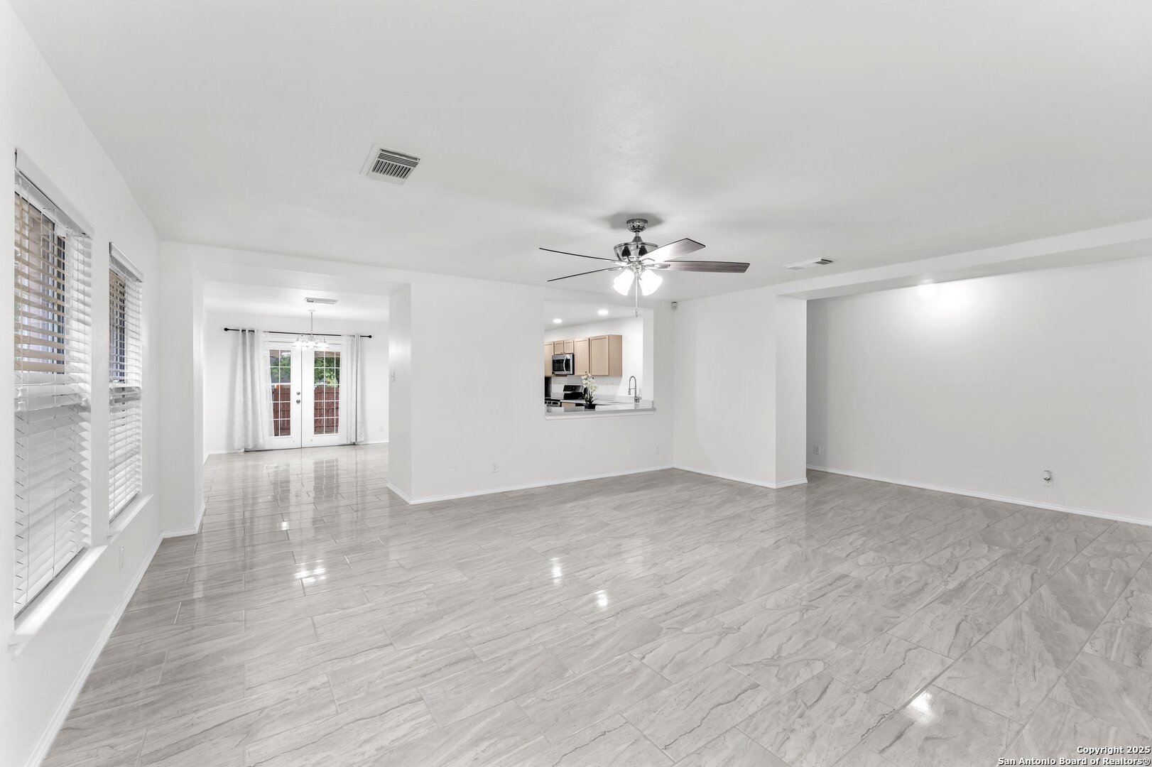 15515 Spring Summit San Antonio, TX 78247 - Photo 7 of 36 wooden floor in an empty room with a window