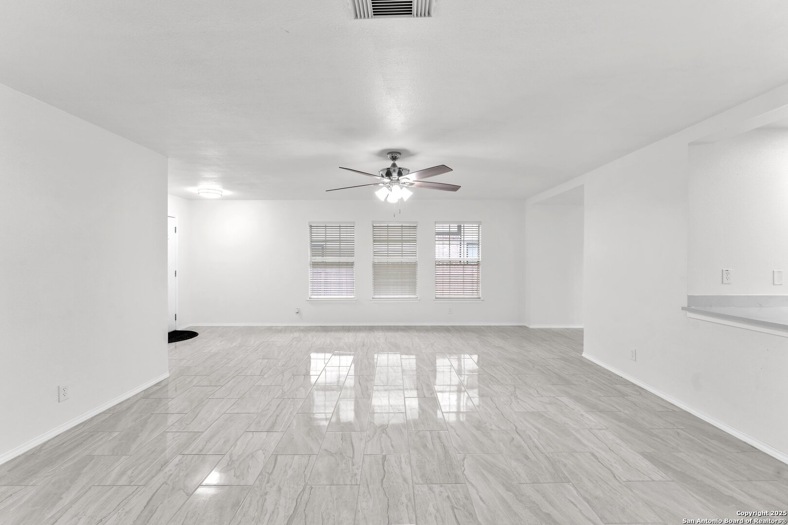 15515 Spring Summit San Antonio, TX 78247 - Photo 8 of 36 wooden floor in an empty room with a window