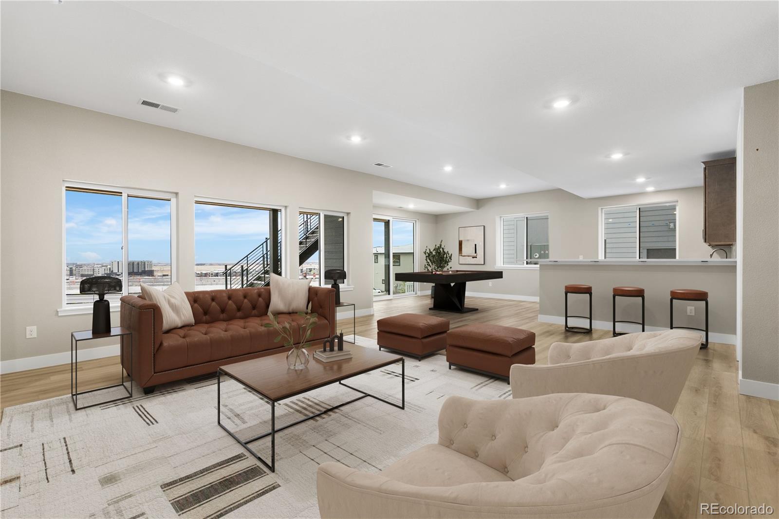 11293 Tenor Trail Lone Tree, CO 80134 - Photo 12 of 50 a living room with furniture and a view of kitchen