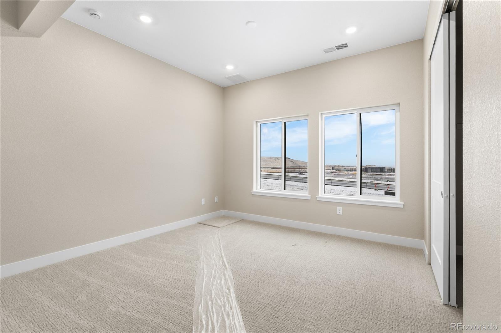 11293 Tenor Trail Lone Tree, CO 80134 - Photo 21 of 50 an empty room with a window