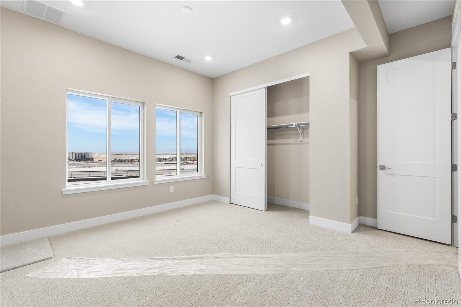 11293 Tenor Trail Lone Tree, CO 80134 - Photo 22 of 50 a view of an empty room with a window