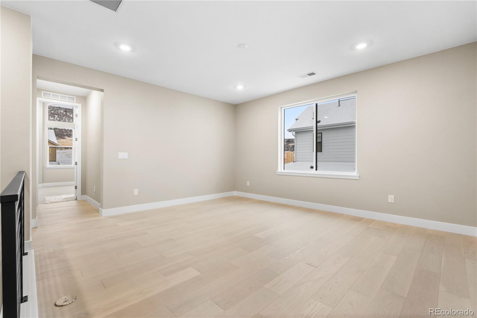 11293 Tenor Trail Lone Tree, CO 80134 - Photo 25 of 50 a view of an empty room with a window