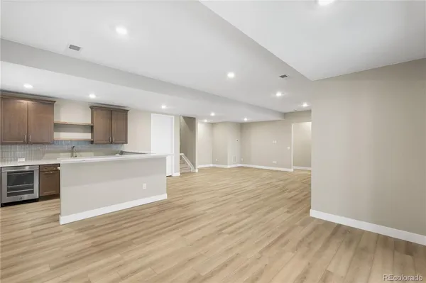 a view of kitchen with wooden floor