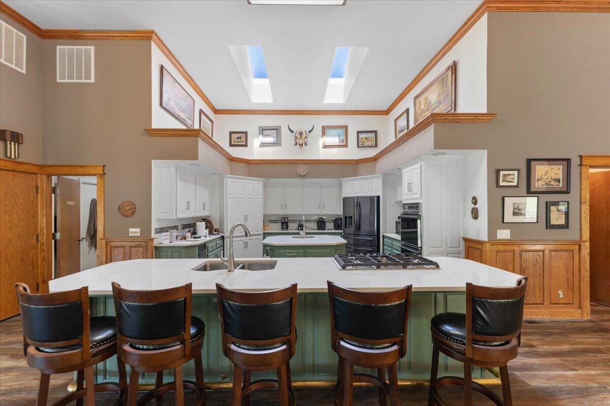 26602 Snider Ranch Road Oak Run, CA 96069 - Photo 27 of 97 a kitchen with a dining table and chairs