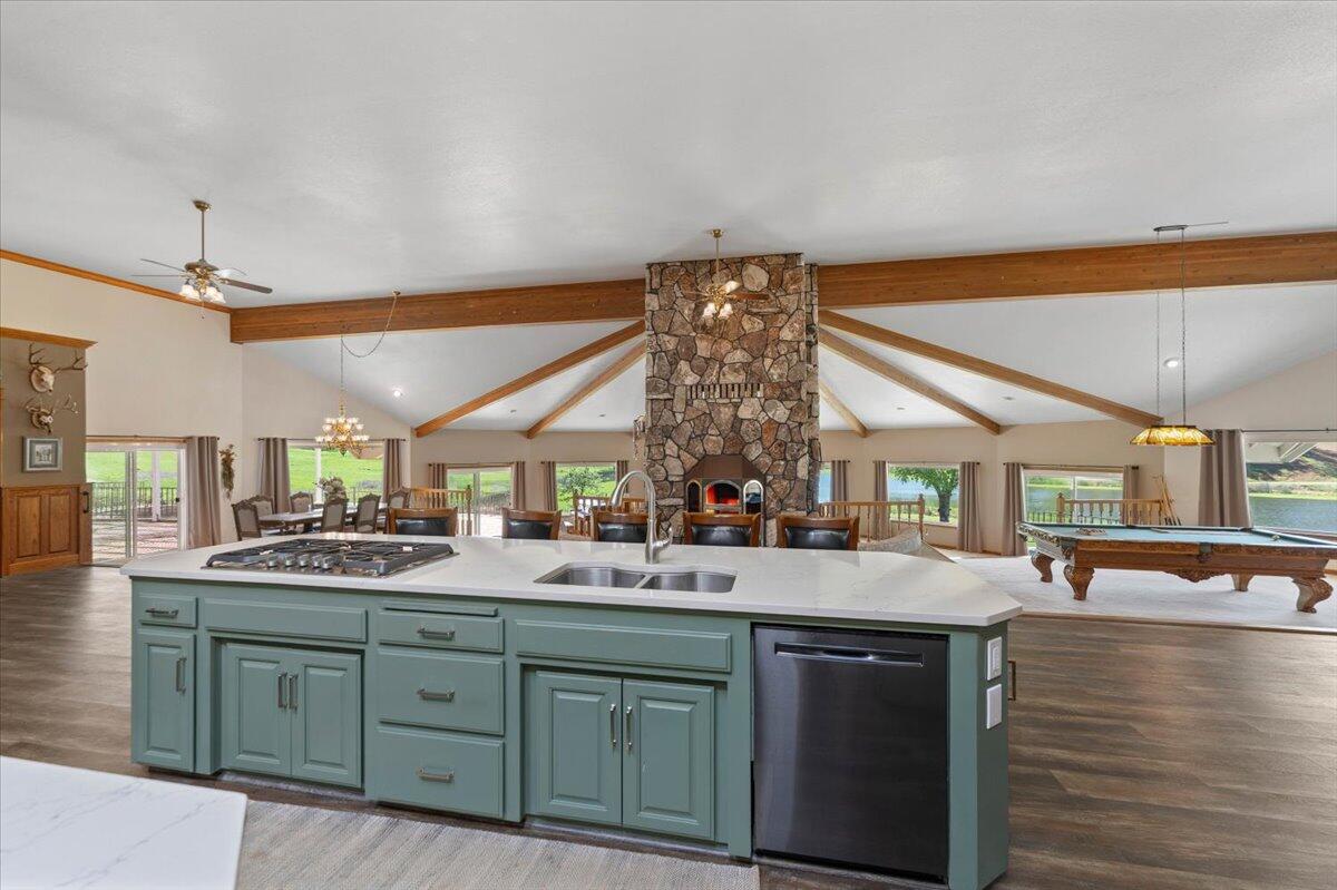 26602 Snider Ranch Road Oak Run, CA 96069 - Photo 29 of 97 a bathroom with a sink and a large mirror