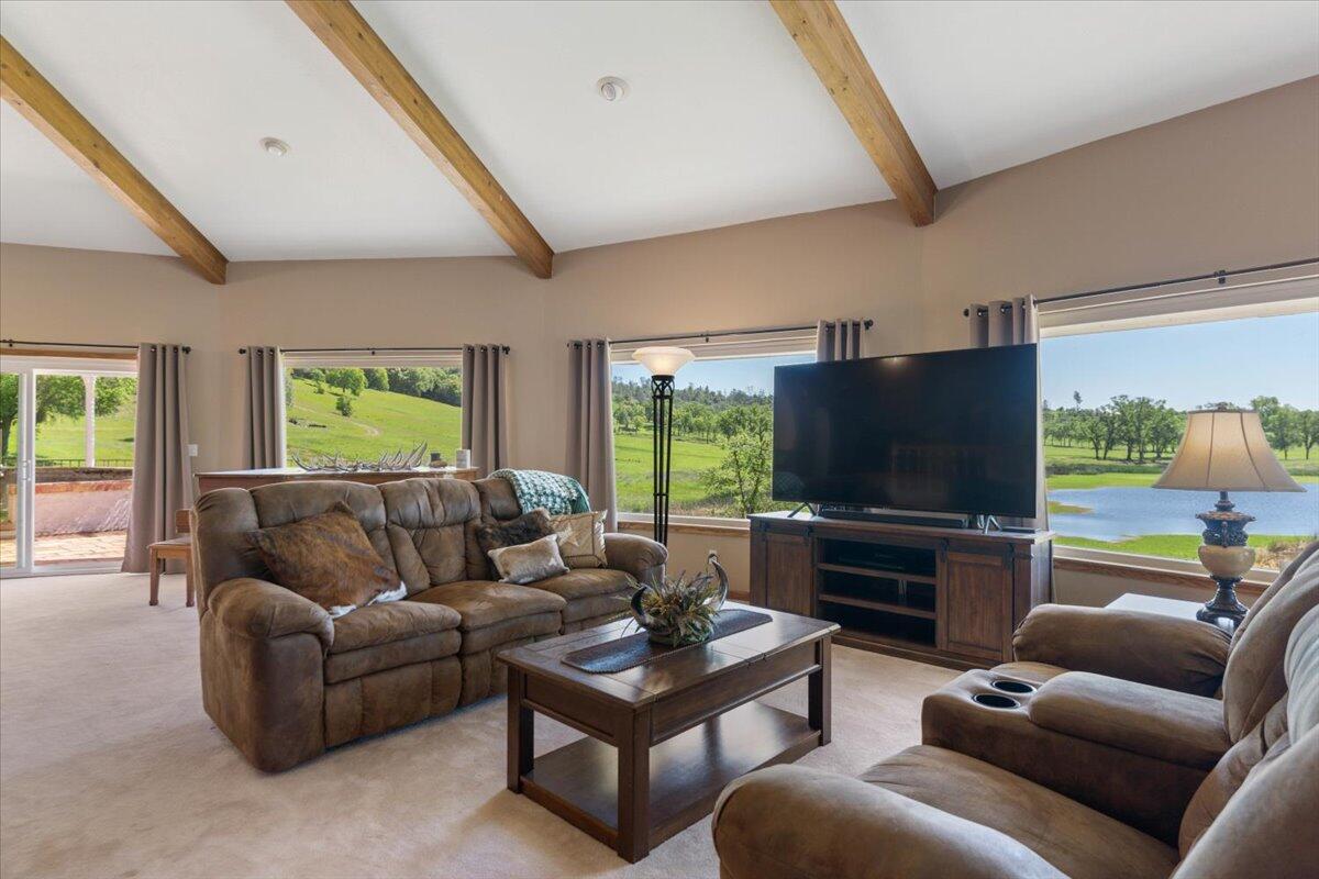 26602 Snider Ranch Road Oak Run, CA 96069 - Photo 34 of 97 a living room with furniture and a flat screen tv