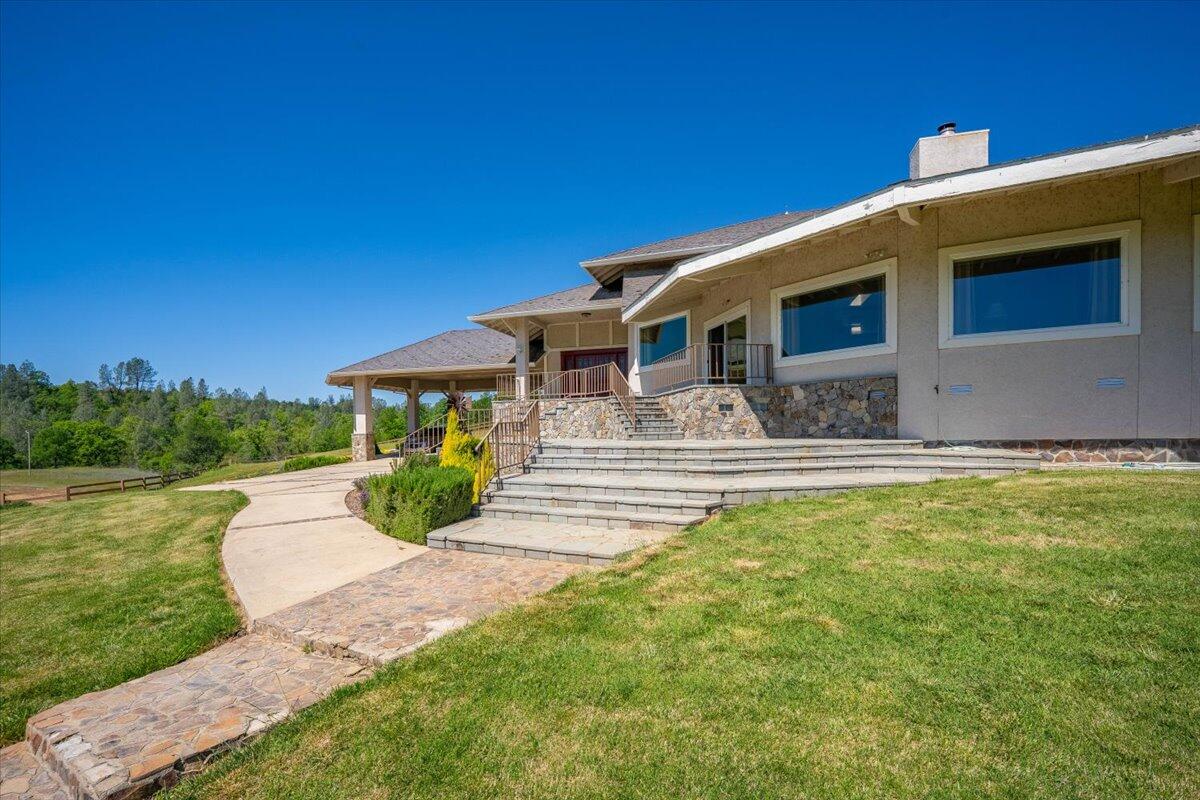 26602 Snider Ranch Road Oak Run, CA 96069 - Photo 45 of 97 a front view of a house with garden