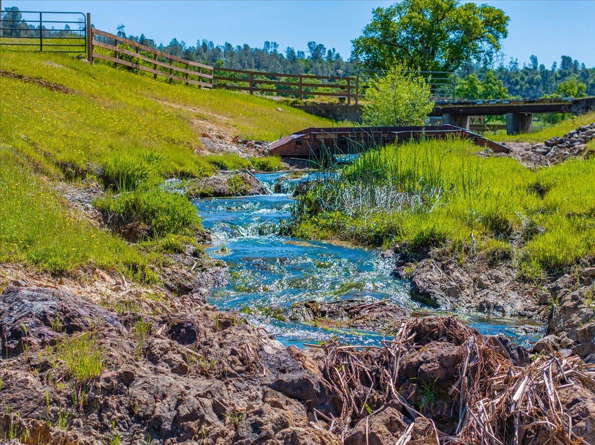 26602 Snider Ranch Road Oak Run, CA 96069 - Photo 58 of 97 a view of a large body of water with a building in the background