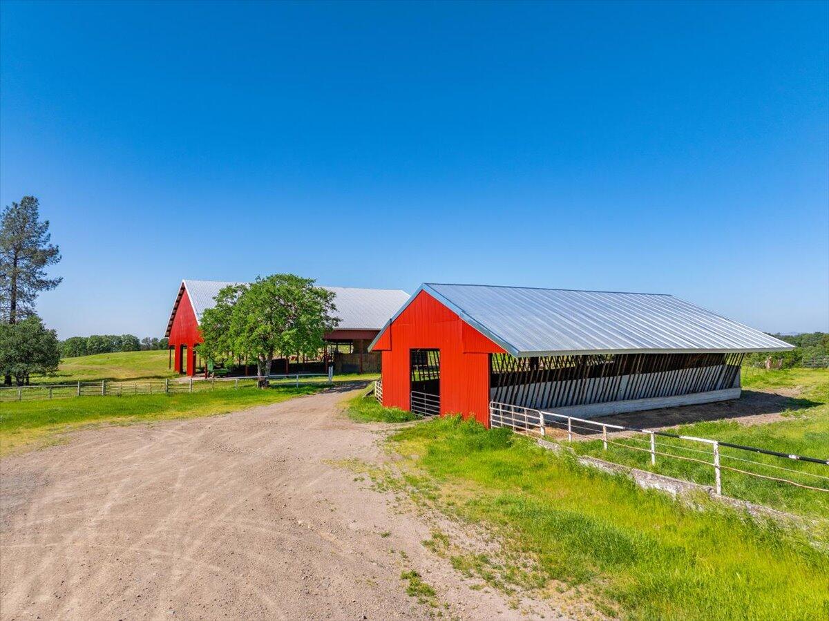 26602 Snider Ranch Road Oak Run, CA 96069 - Photo 71 of 97 a front view of house with yard and trees in the background