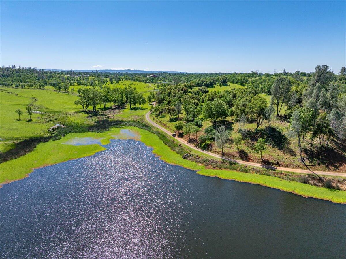 26602 Snider Ranch Road Oak Run, CA 96069 - Photo 83 of 97 a view of a lake with a big yard