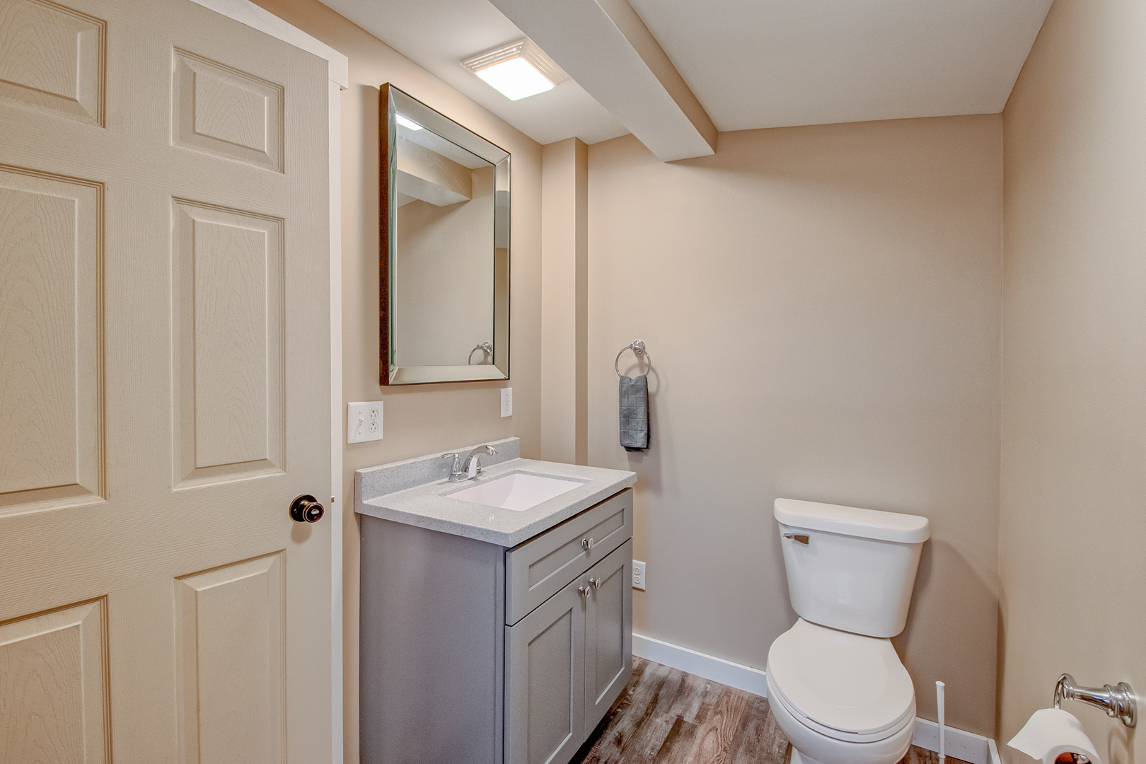 26769 North Genesee Street Wauconda, IL 60084 - Photo 11 of 16 a bathroom with a toilet sink and mirror
