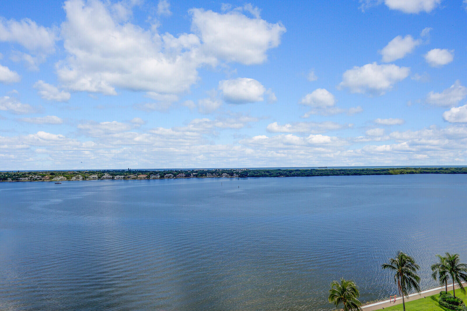 132 Lakeshore Drive, Unit 1117 North Palm Beach, FL 33408 - Photo 30 of 35 a view of a lake and mountain in the back