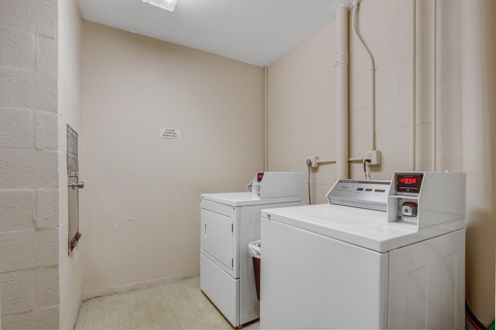 132 Lakeshore Drive, Unit 1117 North Palm Beach, FL 33408 - Photo 33 of 35 a utility room with dryer and washer
