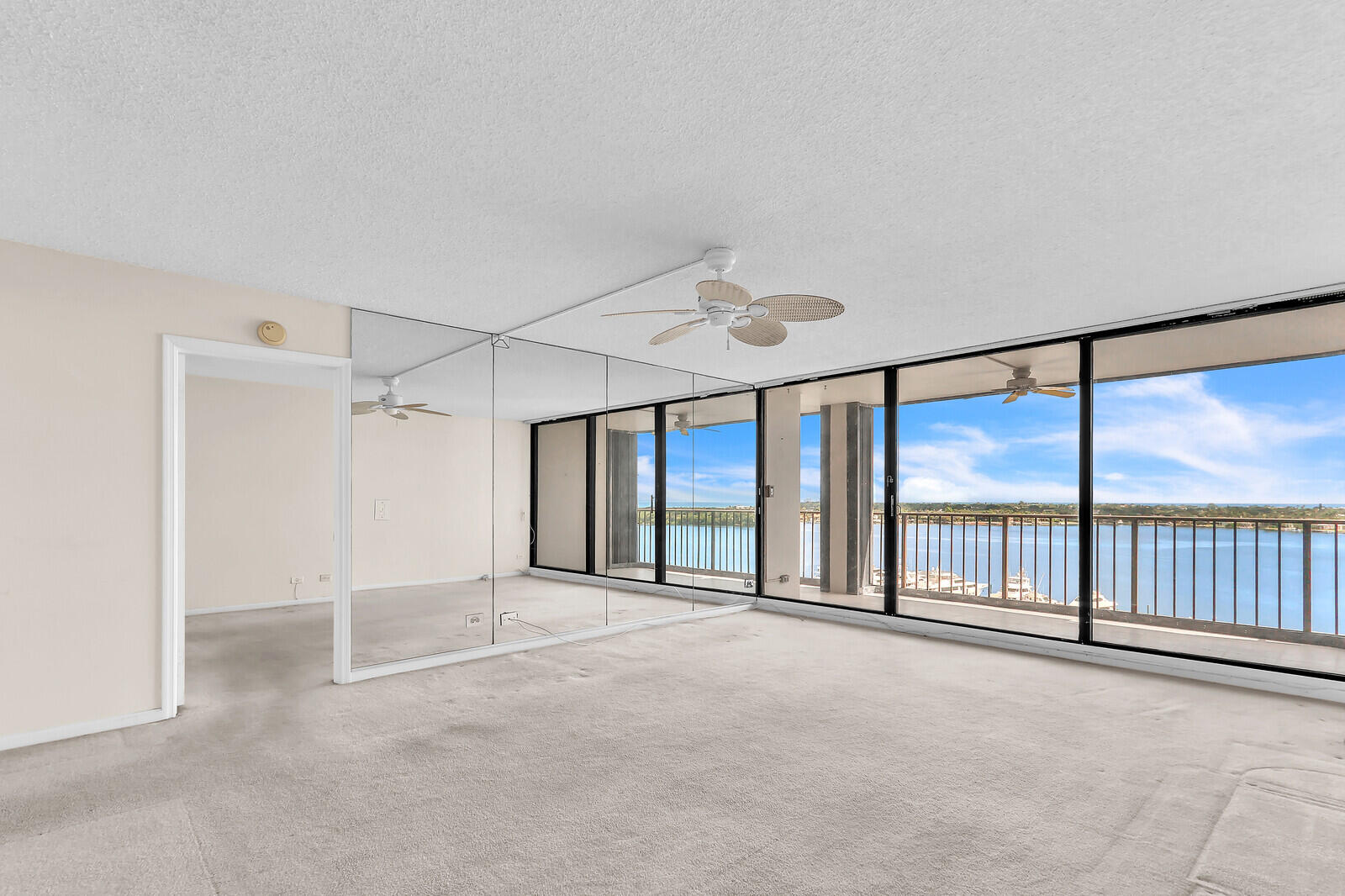 132 Lakeshore Drive, Unit 1117 North Palm Beach, FL 33408 - Photo 7 of 35 a view of an empty room with a window