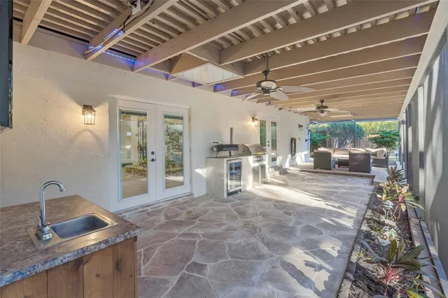 a view of a swimming pool with a patio