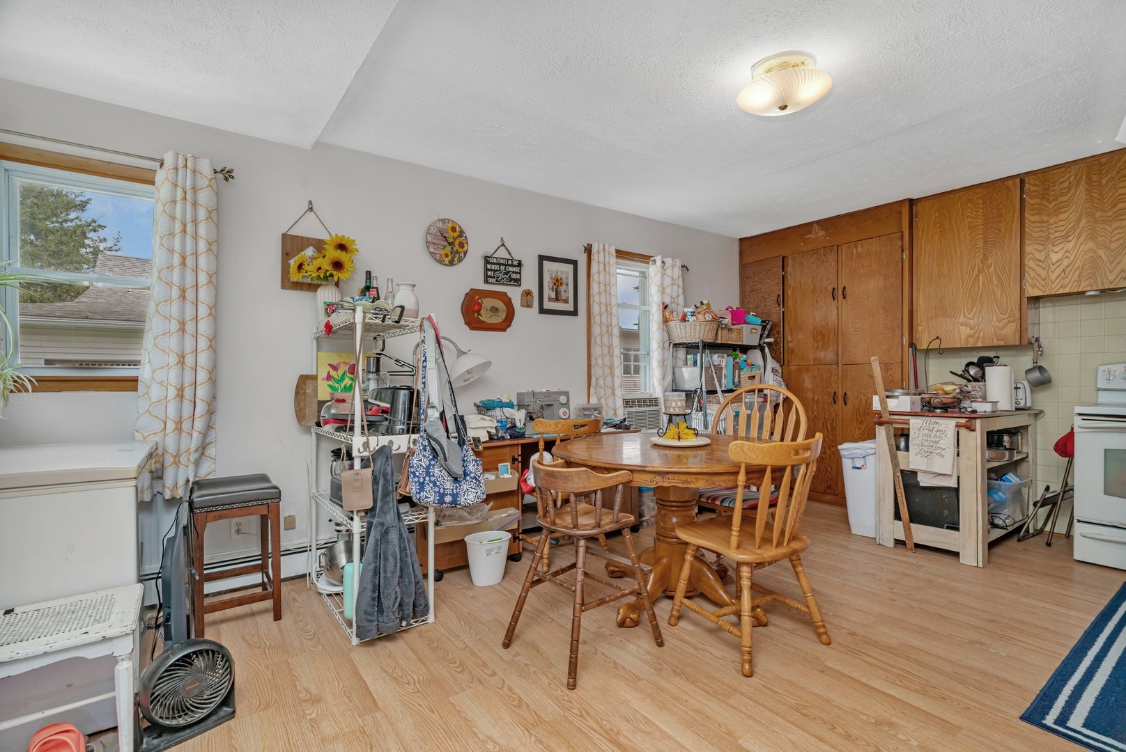 107 North Elm Street Gardner, IL 60424 - Photo 13 of 40 a view of a dining room with furniture and wooden floor