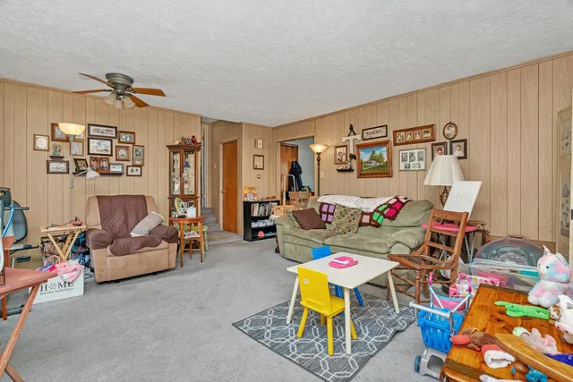 a living room with furniture and a couch