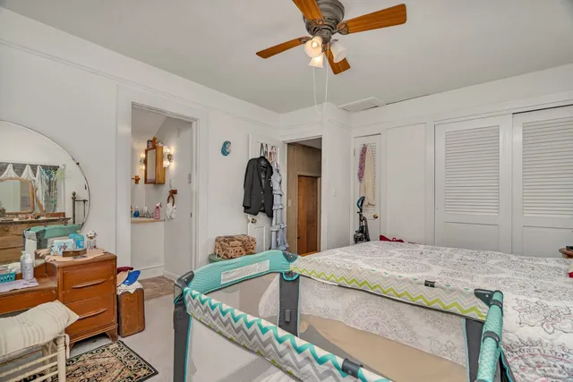 a living room with stainless steel appliances kitchen island granite countertop furniture and a view of living room