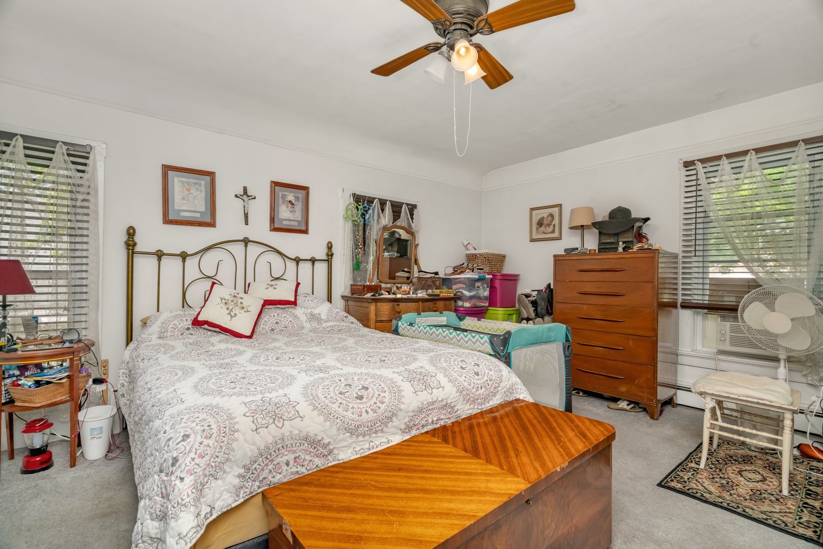 107 North Elm Street Gardner, IL 60424 - Photo 19 of 40 a bedroom with a bed and wooden floor