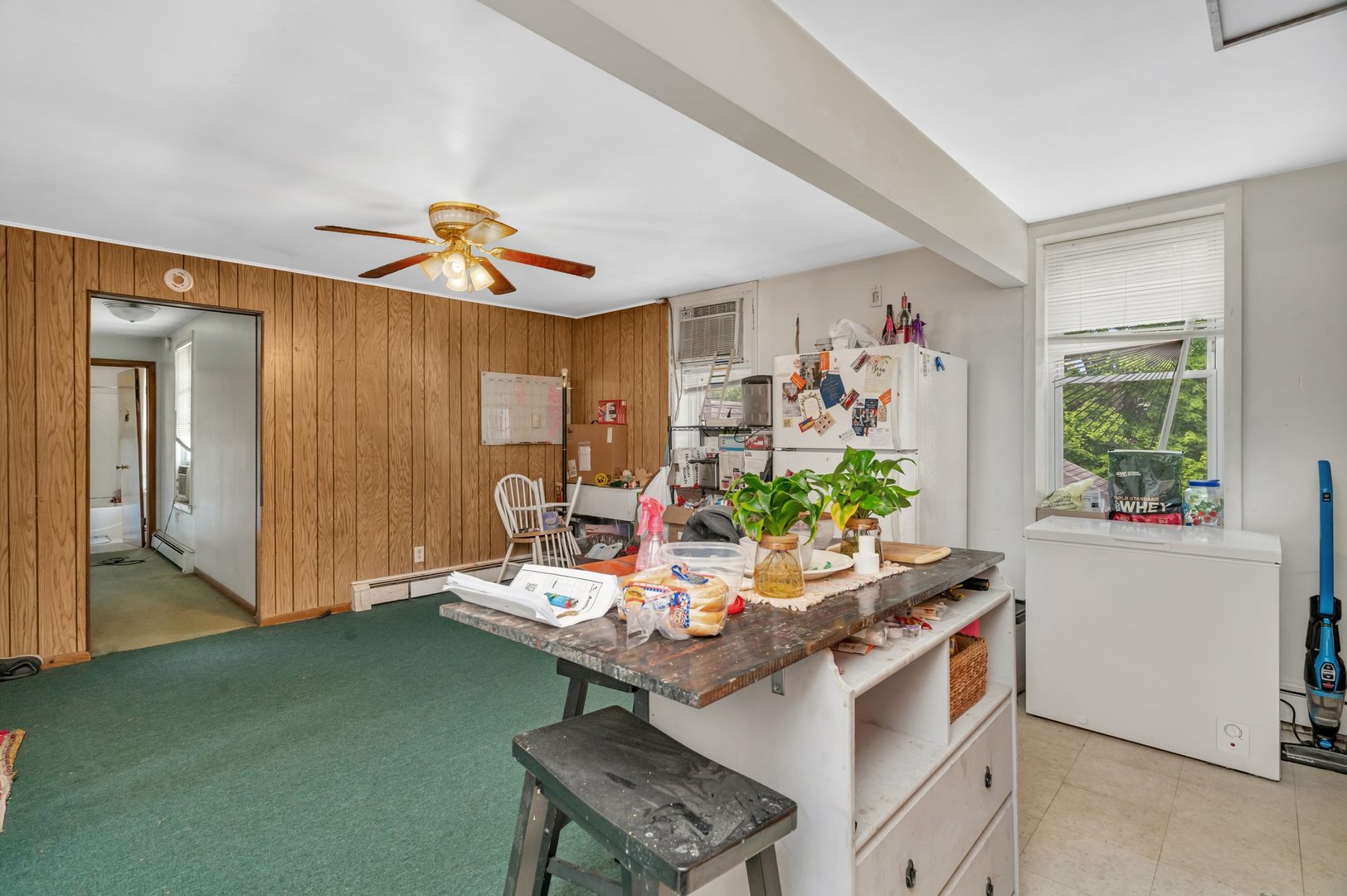 107 North Elm Street Gardner, IL 60424 - Photo 21 of 40 a view of a workspace with furniture and a window